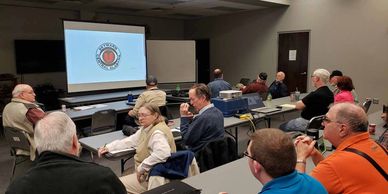 Ham radio classroom giving a license test.