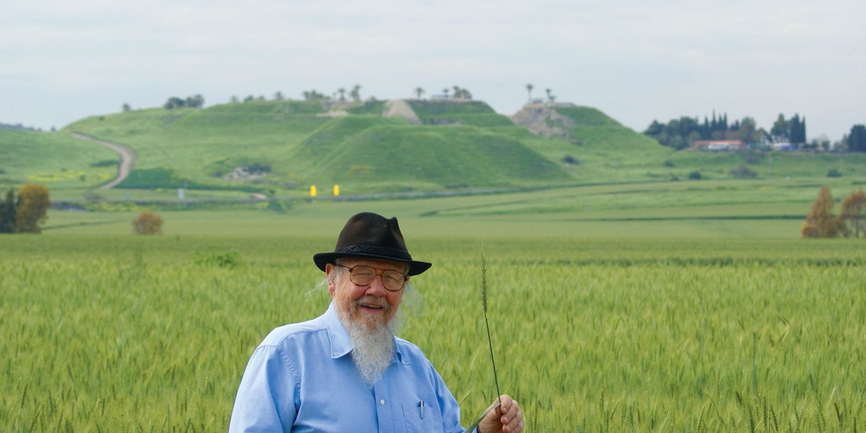 Elder Jacob O. Meyer (OBM) holding a new grain.