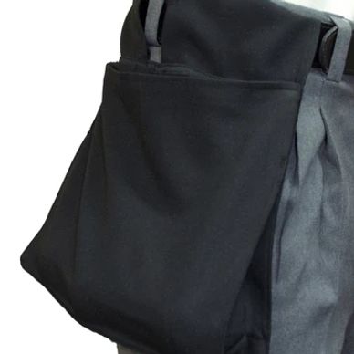Black and grey fabric bag with a pocket.