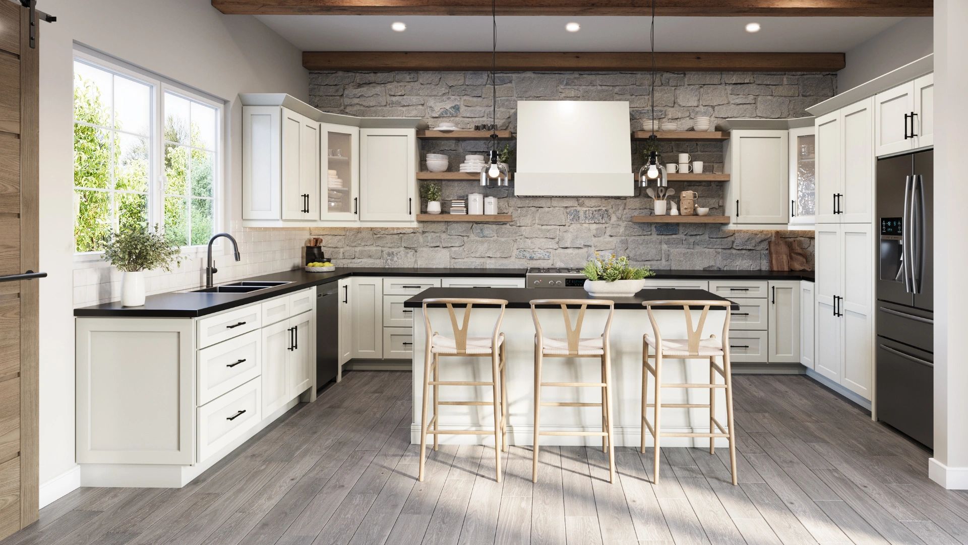 Modern kitchen with white cabinets, stone wall, and wooden stools at the island.