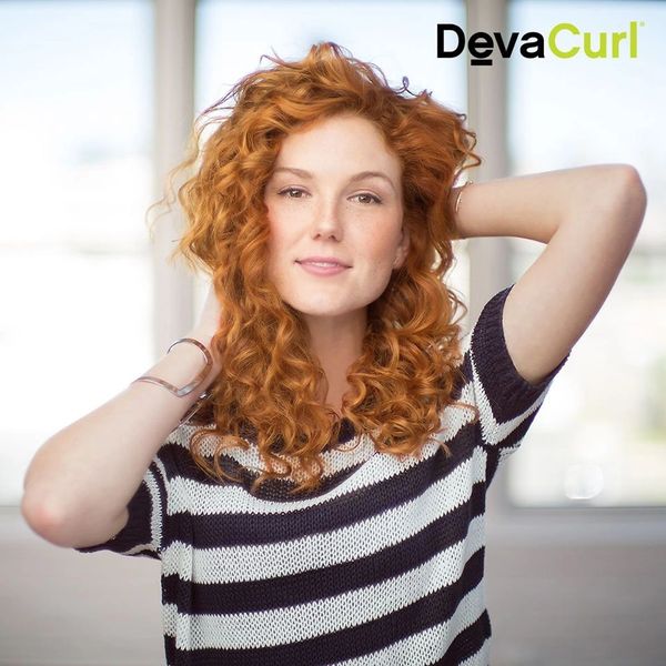 Red hair curly hair woman picture pose