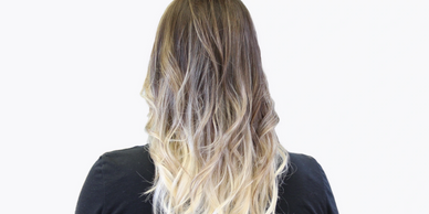 ombre & balayage girl siting on a stylist chair
