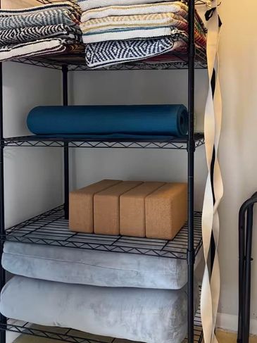 yoga gear, blankets, blocks, belts, yoga mats