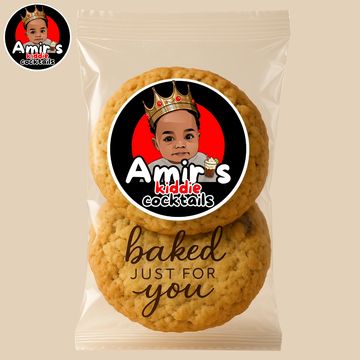 Packaged cookies with a cute logo of a crowned child and the text "baked just for you."