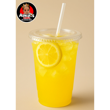 Refreshing yellow lemonade in a clear cup with ice and a lemon slice.