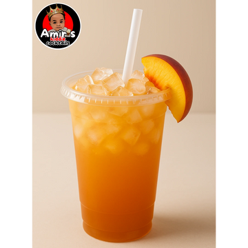 Iced peach drink garnished with a peach slice and a straw.