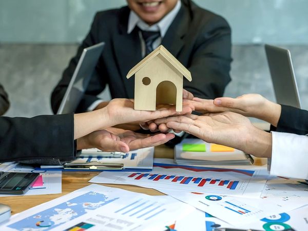 Working as a teamwork of real estate businesses.