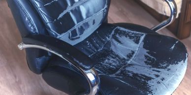 decommissioning
decommissioned chair
worn out office chair
black chair with silver arm rests