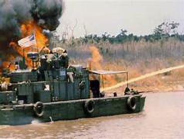 Flame Thrower Cooking Enemy Bunkers. 
Ambushes were common, and our protectors, Navy Riverine Forces