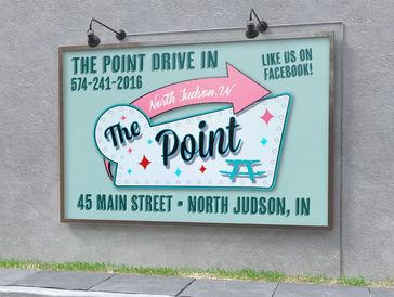 Mockup of sign on gray concrete wall that advertises The Point Drive In in North Judson, Indiana