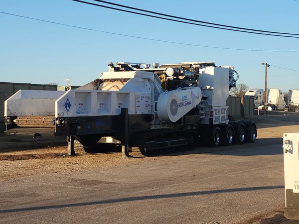 Heavy white industrial tub grinder.