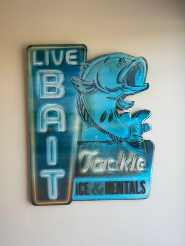 Blue fish-themed live bait sign.