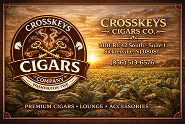 Crosskeys Cigars Company logo with a tobacco field and sunset background.