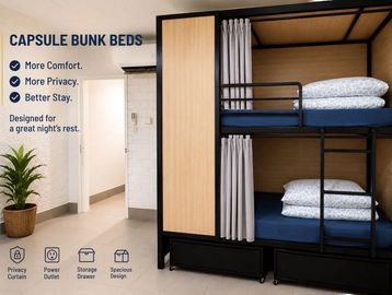 Modern capsule-style dorm with privacy curtains.