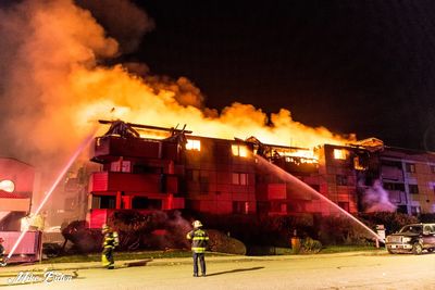 A fire ravages a small apartment overlooking Skaha Lake.