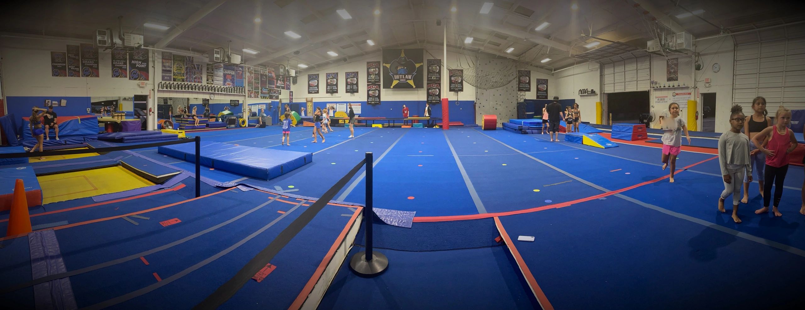 Large tumbling floor, cheerleading, acrobatics, gymnastics, ninja course, trampolines