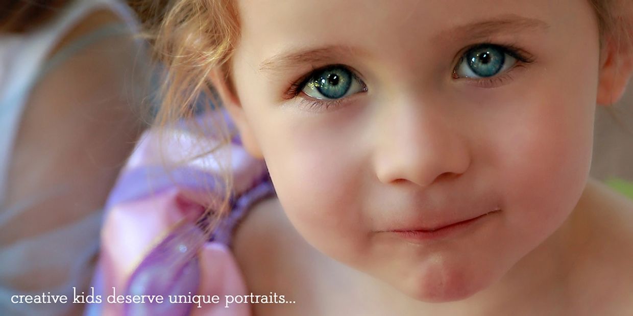 blue-eyed little girl in princess gown with caption "creative kids deserve unique portraits"
