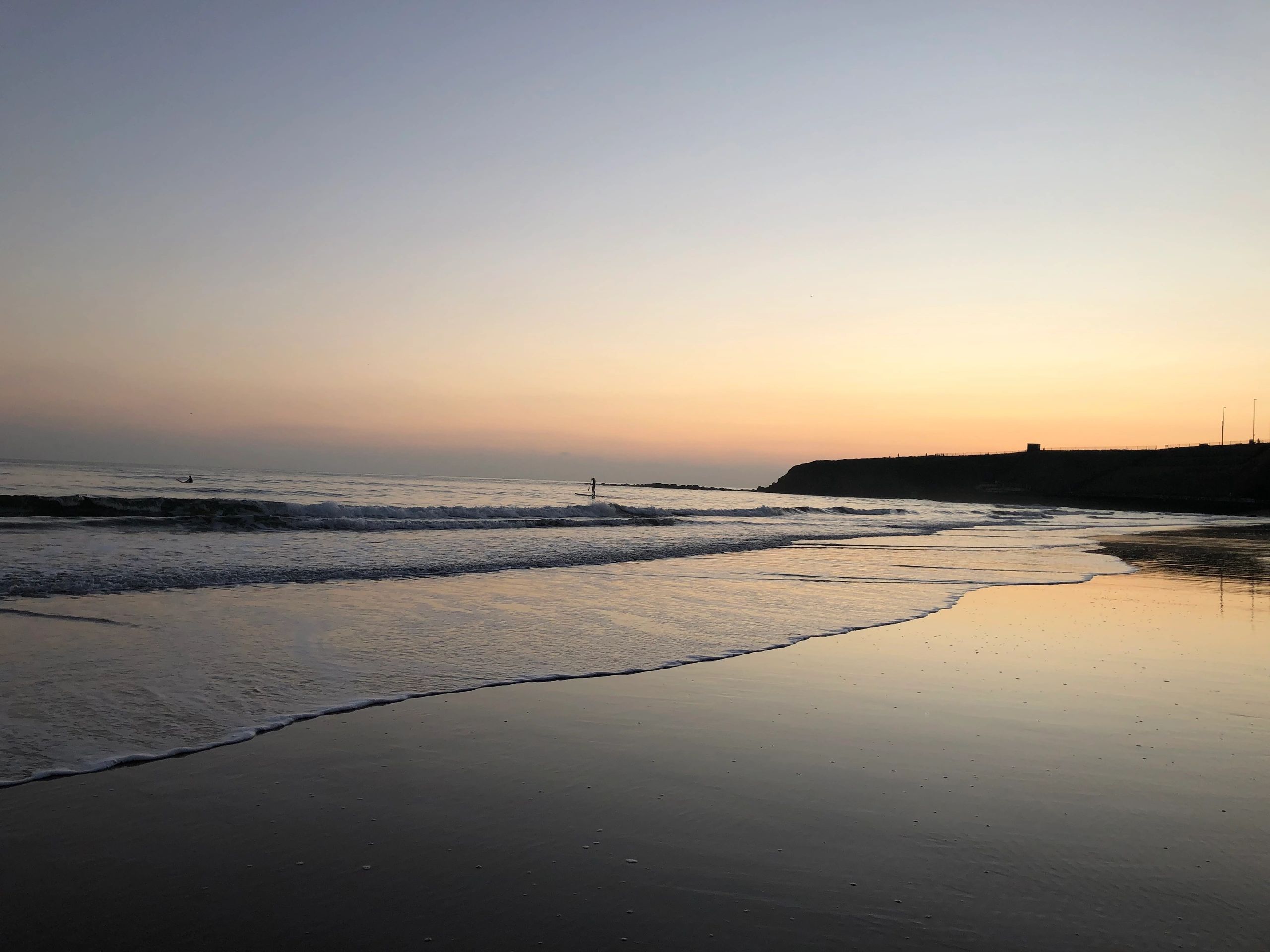 sunset over tynemouth beach