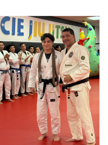 Black Belt instructor awards son Black Belt after 19 years of training Gracie Jiu Jitsu, Brazilian J