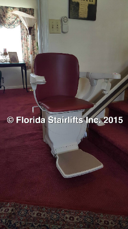 Stannah Stairlifts 600 model with optional Siena cranberry seat 