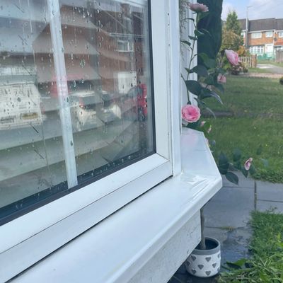 Freshly pressure washed window close up Chatham