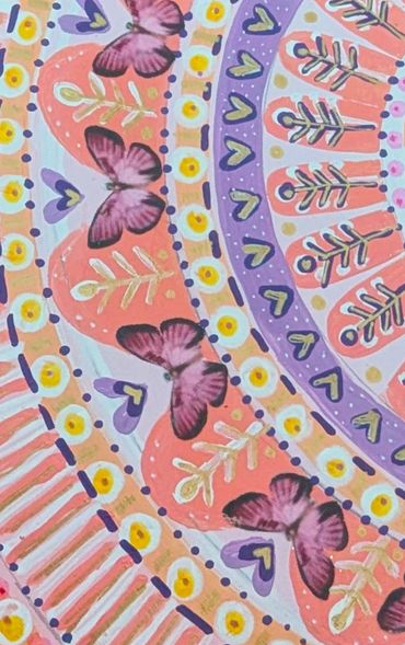 Colorful mandala with butterflies, hearts, and floral patterns in pastel tones.