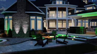Modern house patio with fire pit and green accent lighting at night.