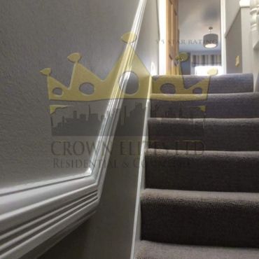 Professionals in painting and decorating in interior clean finish.