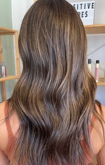 Tone-on-tone brunette with subtle highlights.