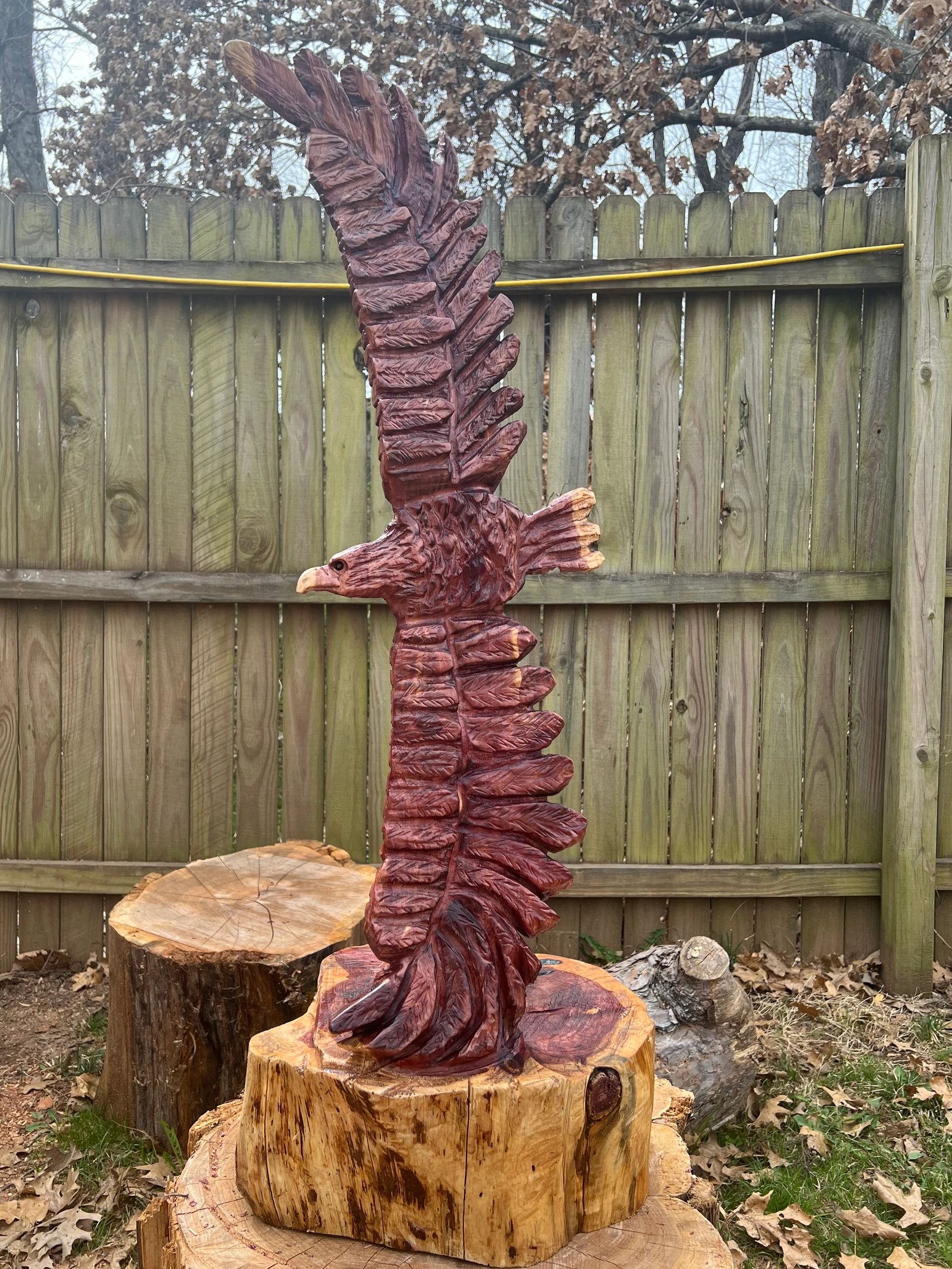 38” tall eastern red cedar log carved into a soaring bald eagle.