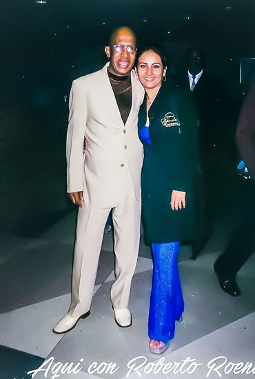 Elisabeth with Roberto Roena.