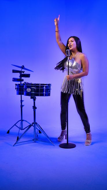 Elisabeth Timbal shines with passion and rhythm as she performs her new salsa single “Por Las Calles