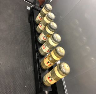 Cylinders are then drained and placed onto a dryer to ensure all moisture is removed.