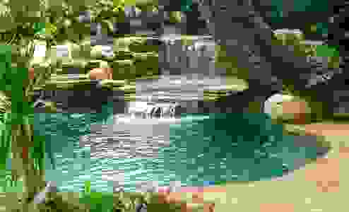 Pool waterfalls in Florida waterfall into swimming pool waterfall company