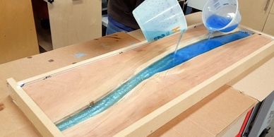 Pouring the Epoxy Resin on the New River Table