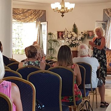 Debbie giving a message in Spain