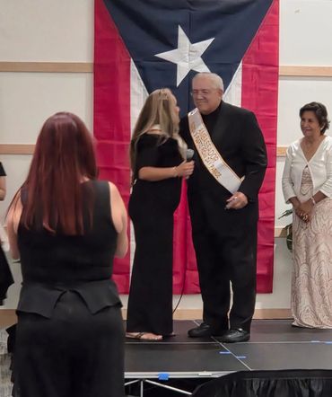 President-Professor Suarez Receiving Grand Marshall award Puerto Rican Parade Brevard County 2025