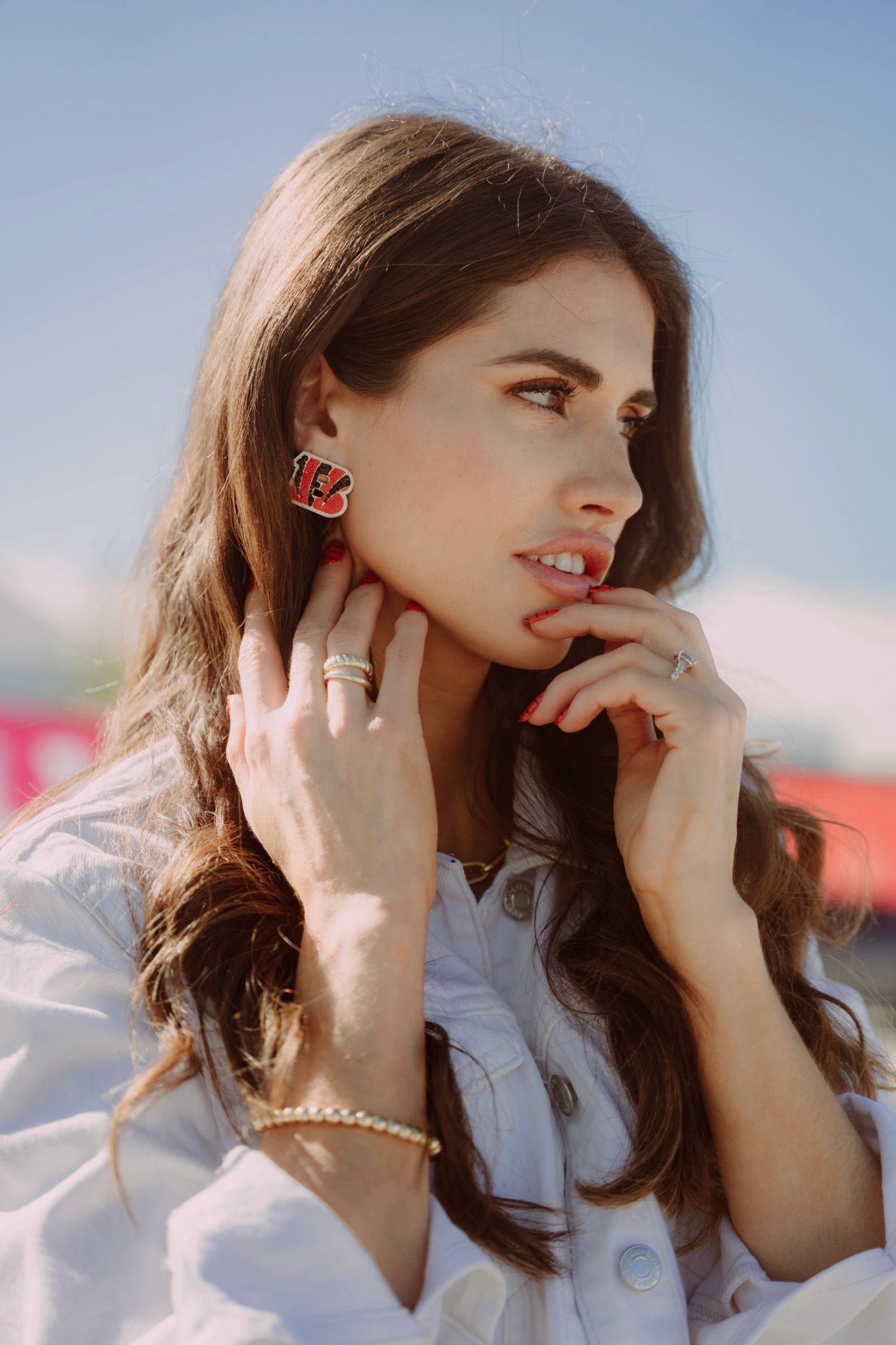 Woman with stylish accessories in natural light.