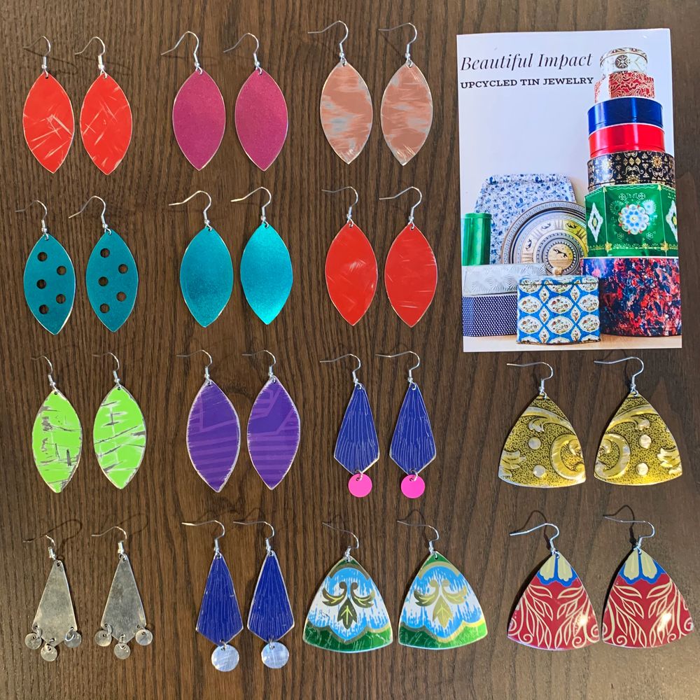 Upcycled handmade tin jewelry made from
Cookie tins. Ecochic jewelry.