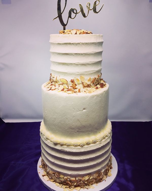 3 tier cake with almonds as the borders