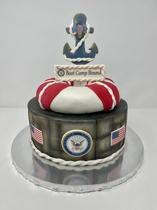 Navy cake with life preserver and anchor.