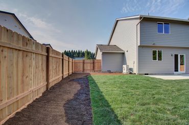 Prairie Homes new grass and fence