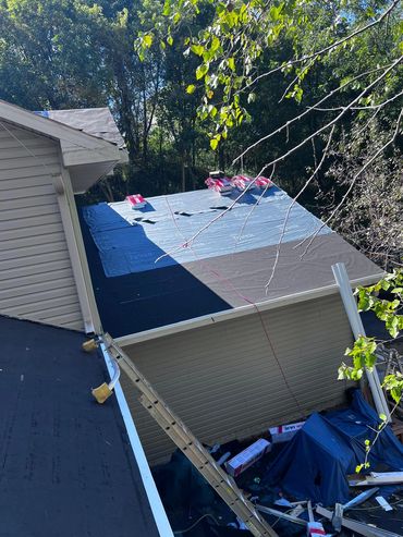 Roof tarp and replacement