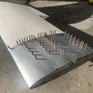 airplane sheet metal clecos rivets wing tip gas tank repair