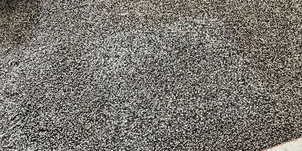 a neat and clean gray color carpet 