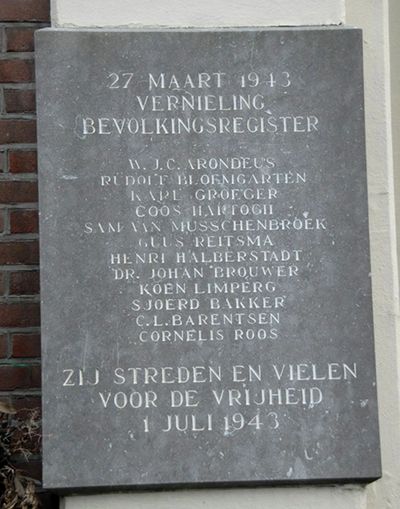 The plaque honouring the men, designed by Willem Sandberg