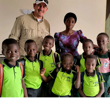 Pictured: Eric Townsend serving an orphanage in Abuja, Nigeria amidst high risk terrorist alerts. Th