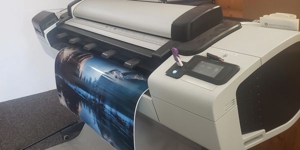 We can print up to 36" wide by any length on our wide format printer. Larger widths available too!