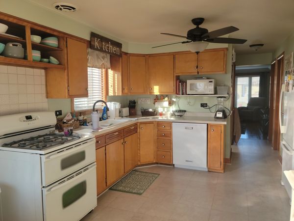 A member's before picture of their kitchen, before obtaining the home improvement loan. 