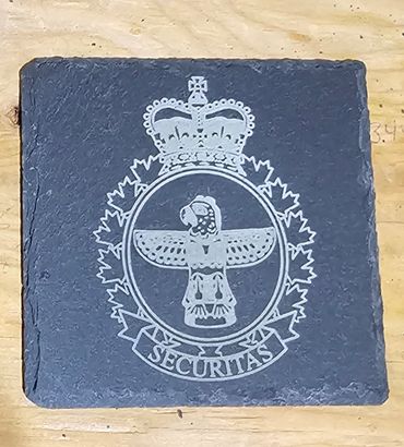Stone plaque with a crowned emblem and 'Securitas' inscription.